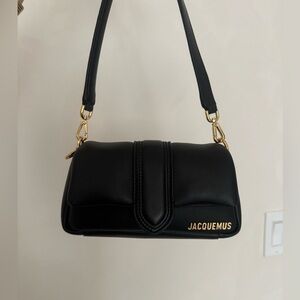 JACQUEMUS 
Black Le Chouchou 'Le Petit Bambimou' Bag